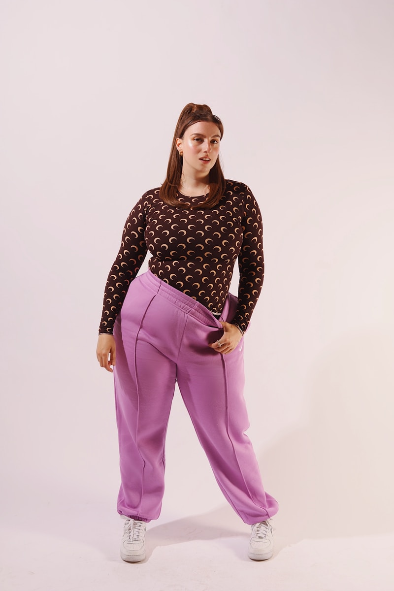 woman in black and white polka dot long sleeve shirt and pink pants