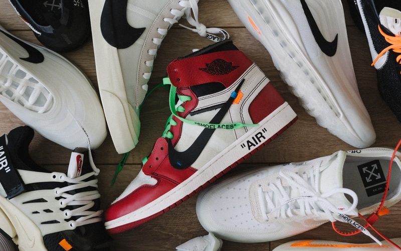 white green and red nike sneakers