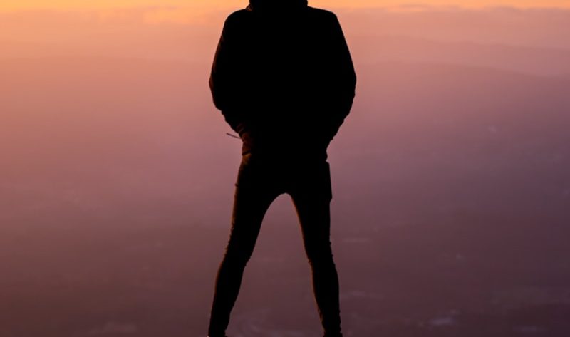 silhouette photography of person jumping