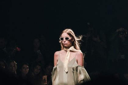 woman in white dress wearing sunglasses